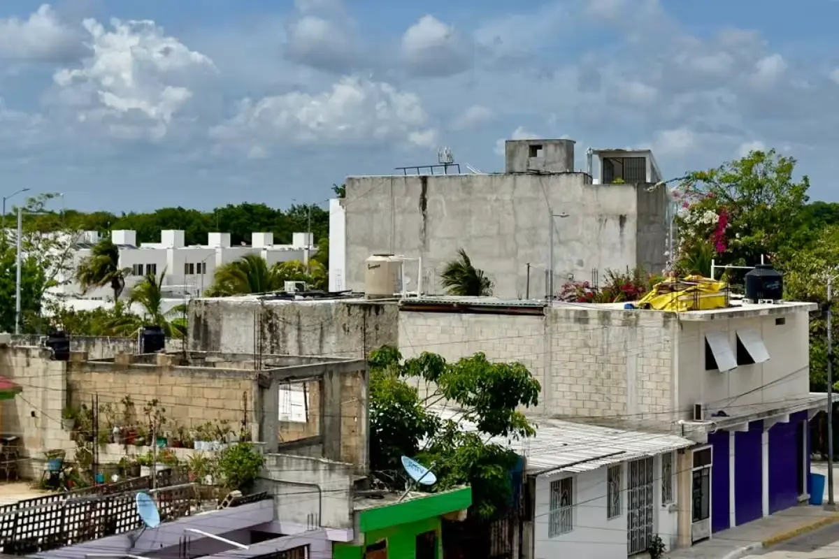 Residents of Playa del Carmen collect water from a low-pressure tap during a water shortage.
