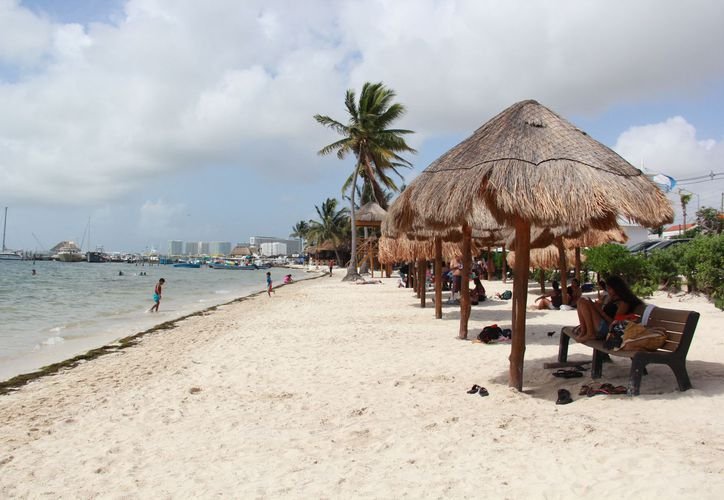 Aerial view of Playa del Niño beach in Cancun with residential buildings in the background