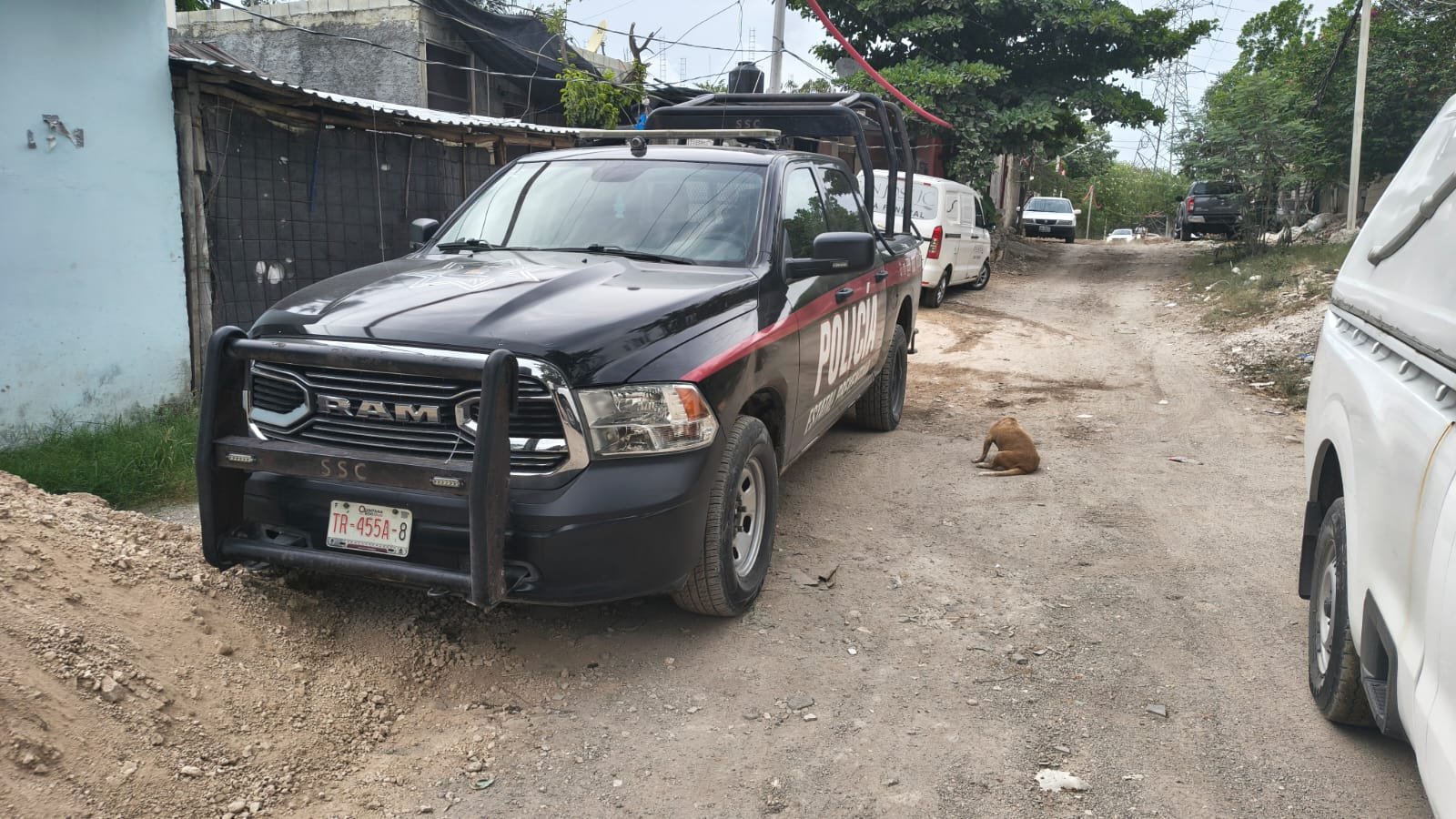Police officers securing a crime scene in the Las Torres neighborhood of Playa del Carmen