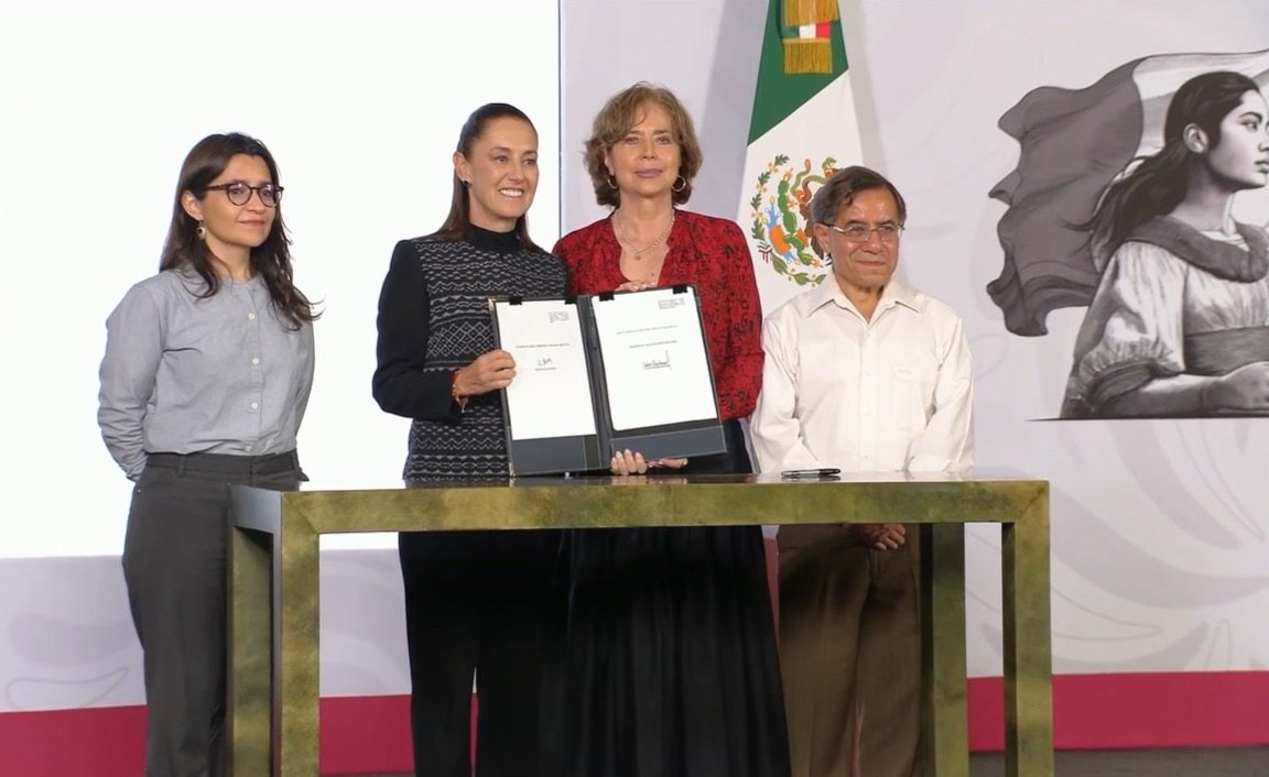 President Claudia Sheinbaum speaking at a podium with the Inehrm logo behind her