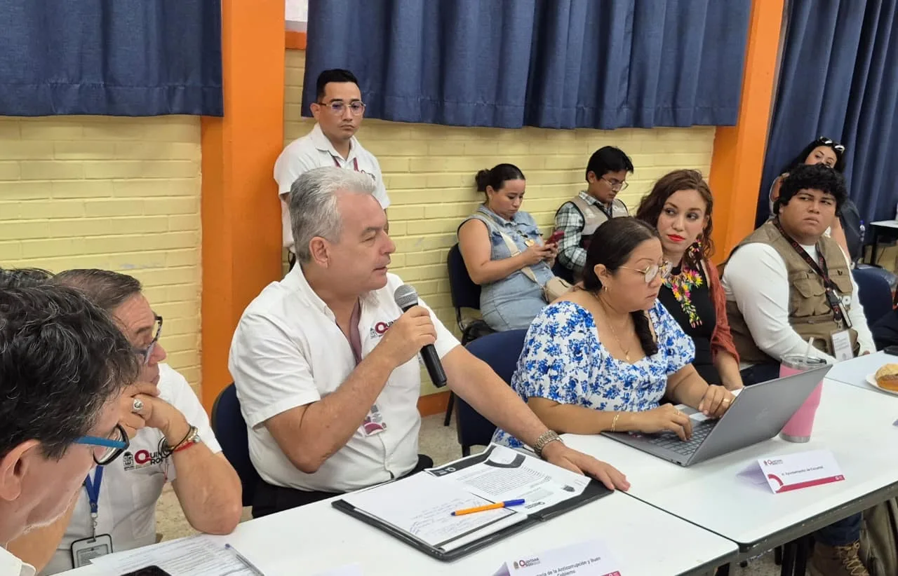 Officials seated at a table during the reinstatement of the State Climate Change Commission in Quintana Roo
