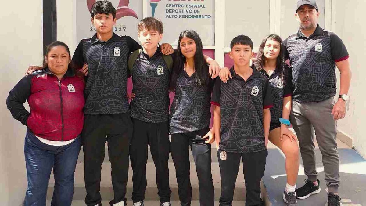 Five young wrestlers from Quintana Roo pose for a photo before competing in the Pan American U15 Wrestling Championships in Mexico City.