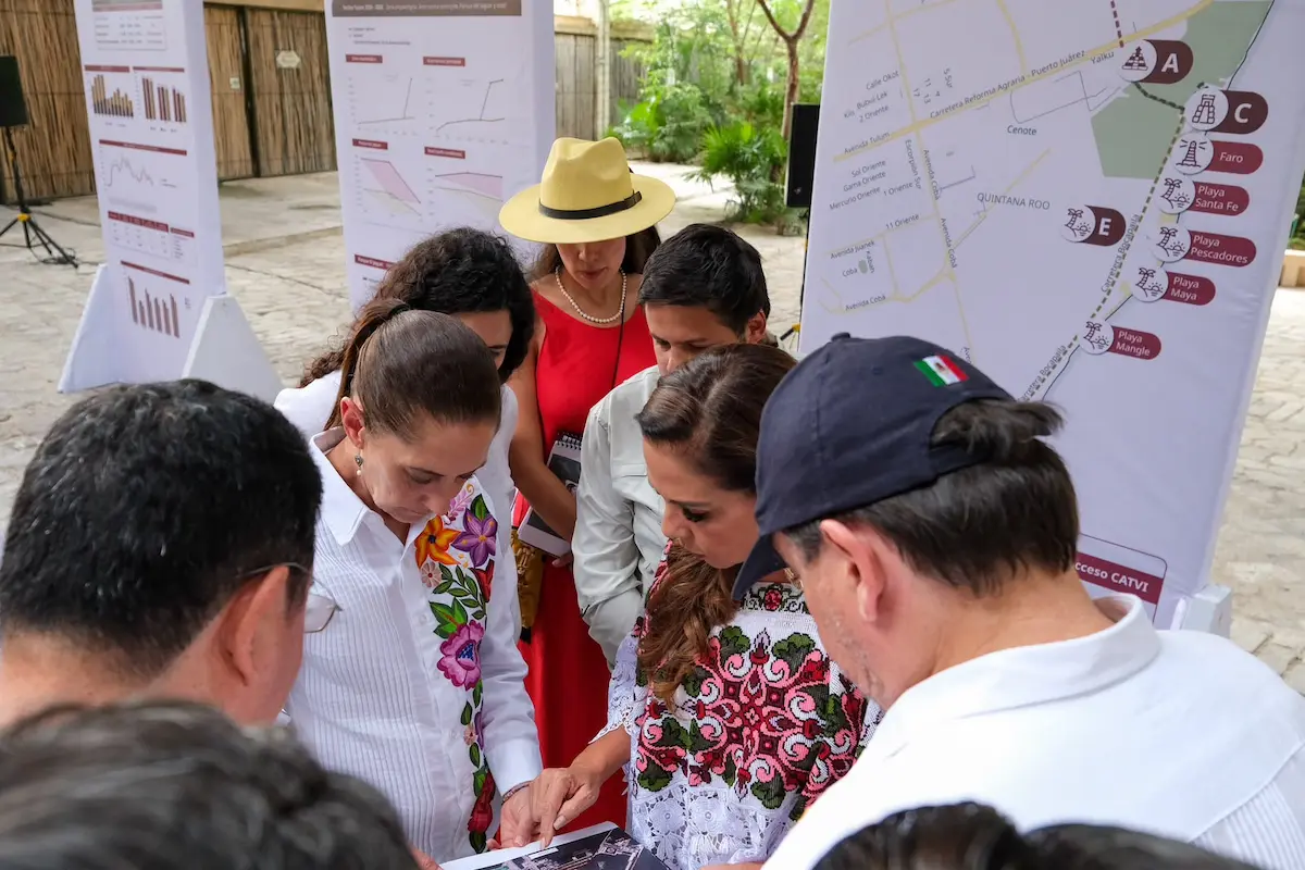 Officials from Mexico's Culture Ministry and INAH at a signing ceremony in Tulum for the Maya Summit agreement