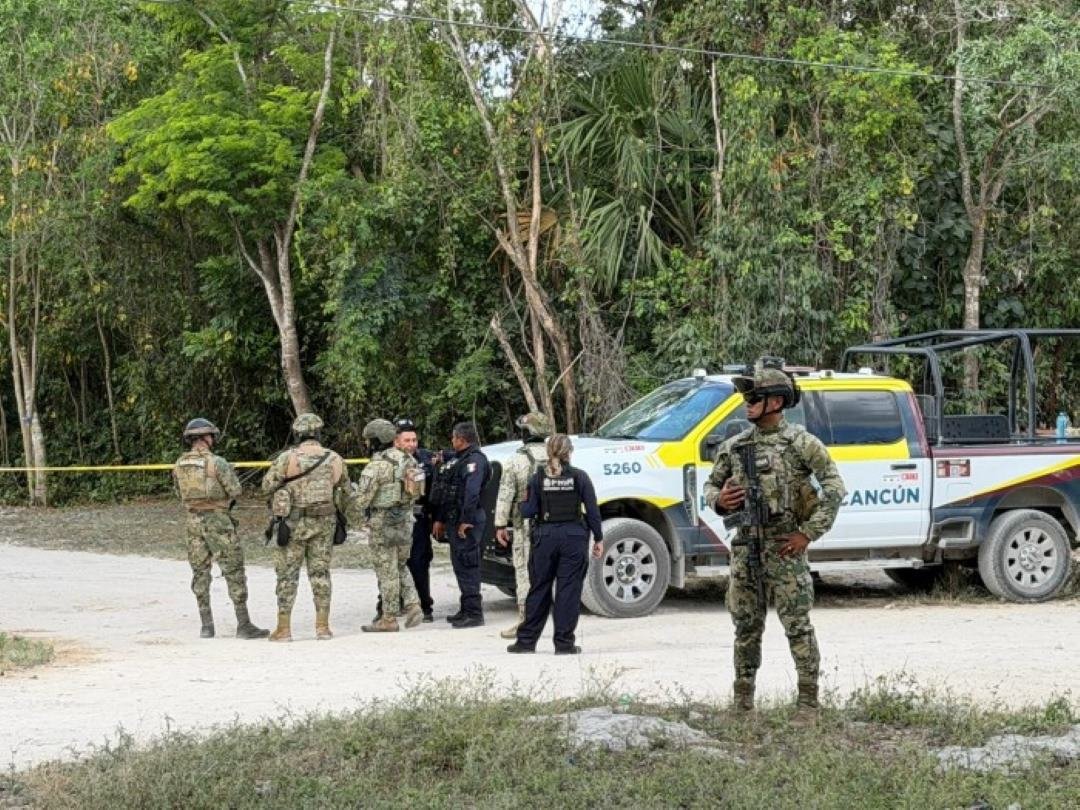 Buckets filled with suspected marijuana seized during a police operation in Cancún