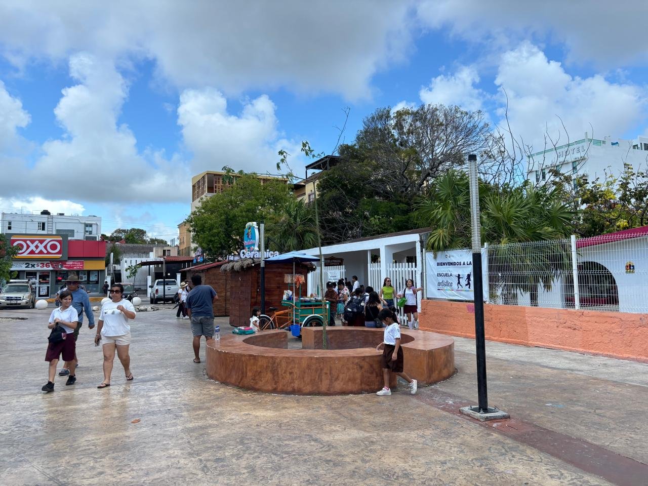 Students walking into a public school building in Quintana Roo