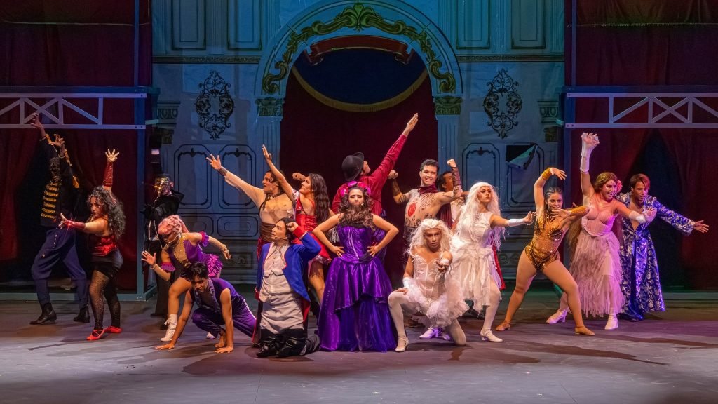 Actors on stage during a performance of The Greatest Show on Earth at Cancun City Theater