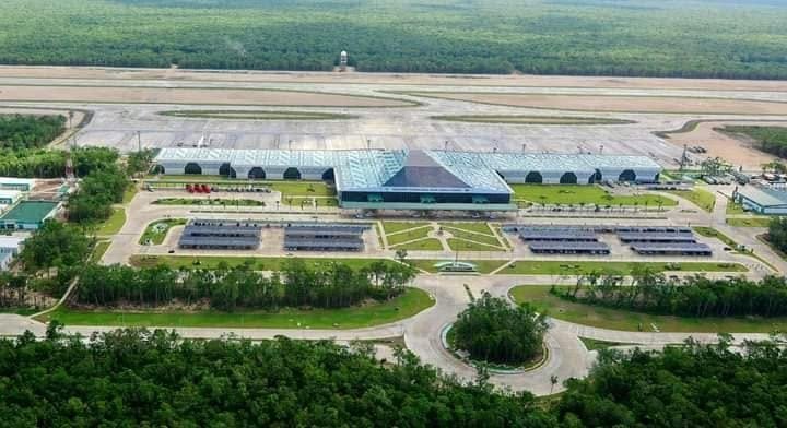 Aerial view of Tulum International Airport terminal and runway
