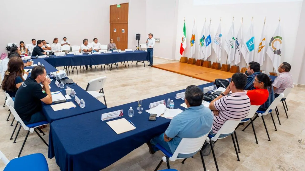 Officials and citizens at a meeting about updating property tax values in Tulum