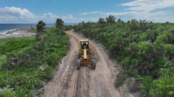 Construction workers on a road rehabilitation project in Tulum, Quintana Roo