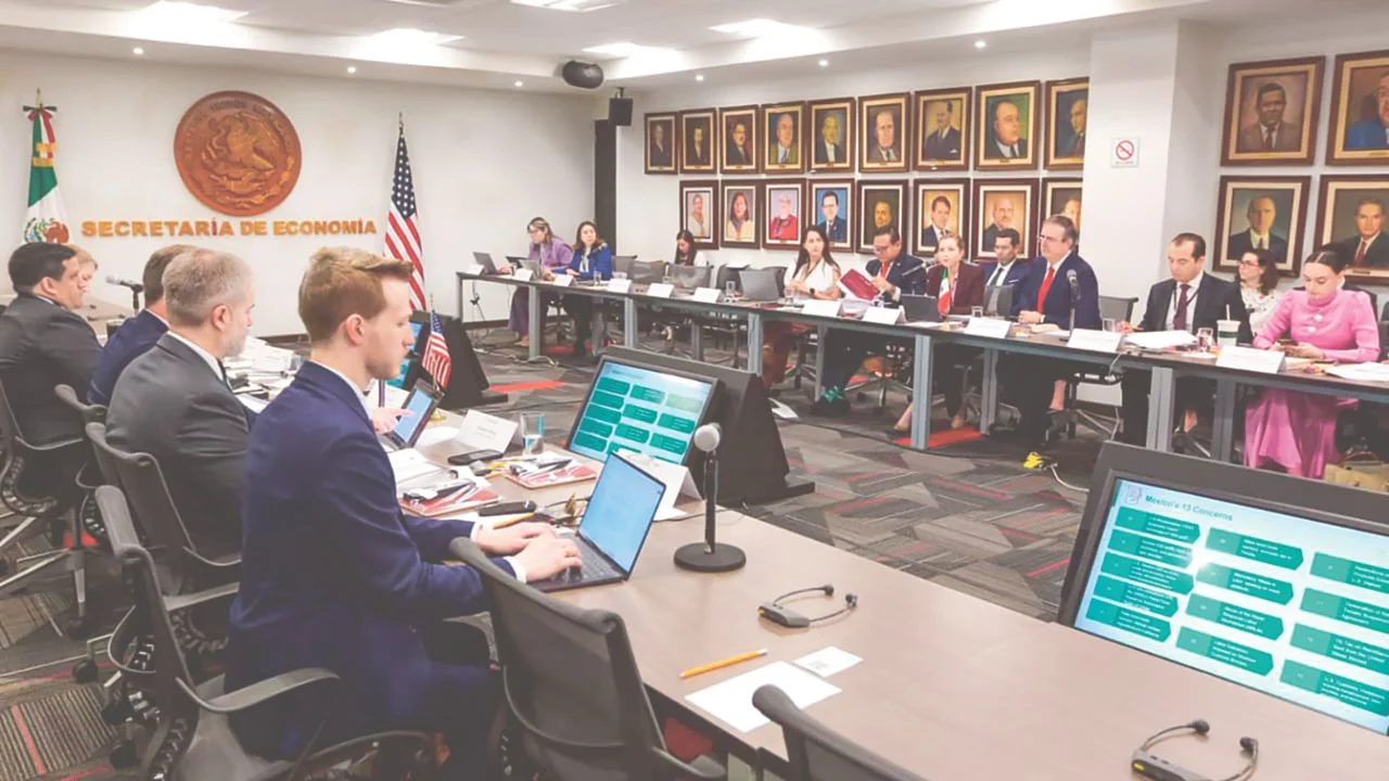 US and Mexican trade officials seated at a conference table during the third round of USMCA negotiations in Mexico City