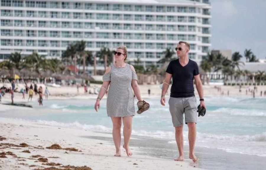 Tourists on a beach in Cancun, Mexico