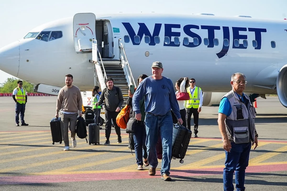 A WestJet Boeing 737-800 aircraft parked at Merida International Airport