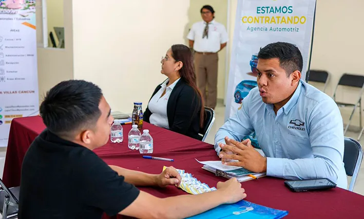 Young job seekers at an employment fair in Cancun, Mexico