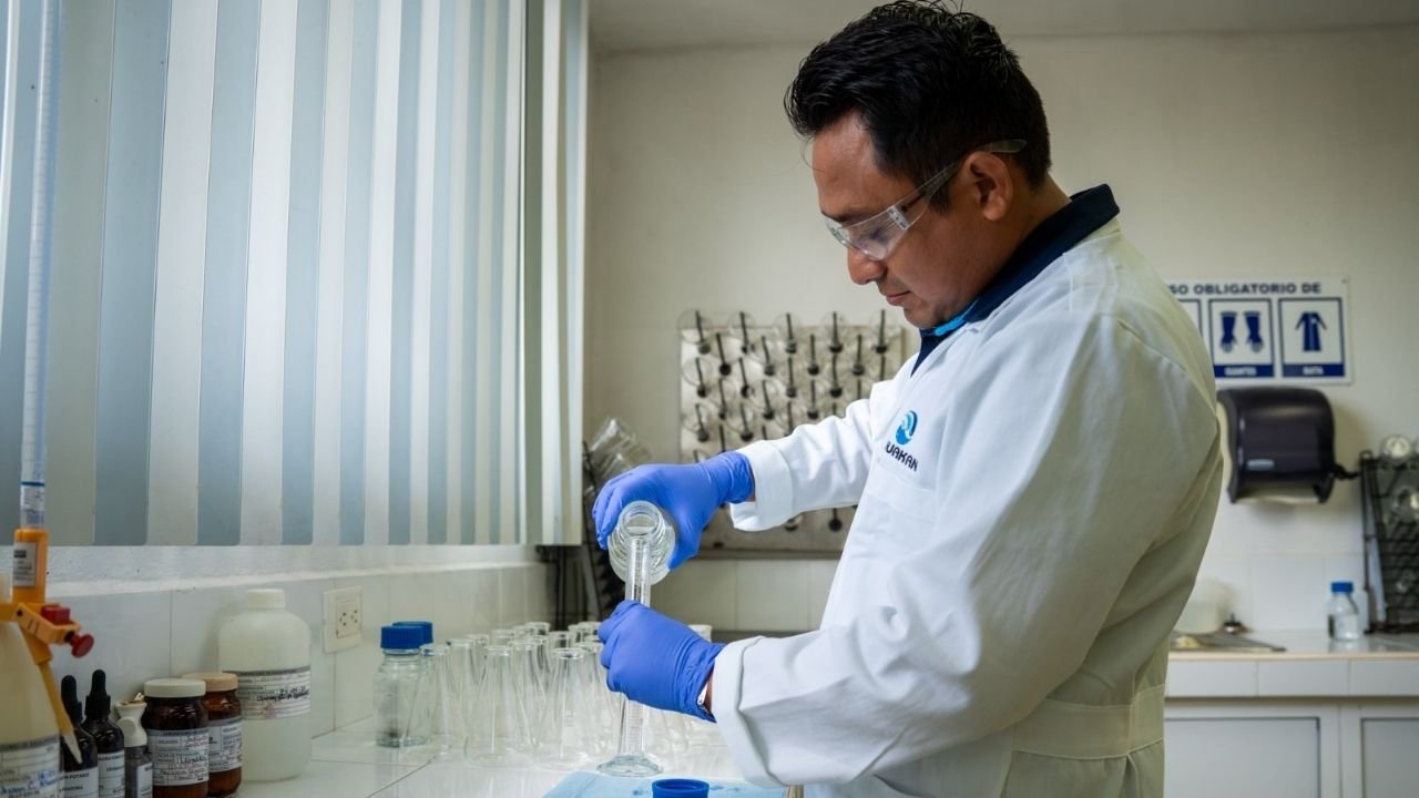 Aguakan technicians test water samples in a laboratory to ensure drinking water quality in Quintana Roo.