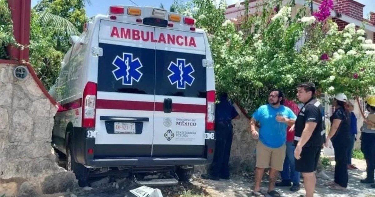 An ambulance rests inside a damaged home after a collision in Chetumal, Quintana Roo.