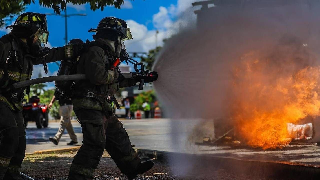 Firefighters from across Quintana Roo compete in obstacle courses at the Bombero Challenge in Cancún, Quintana Roo.