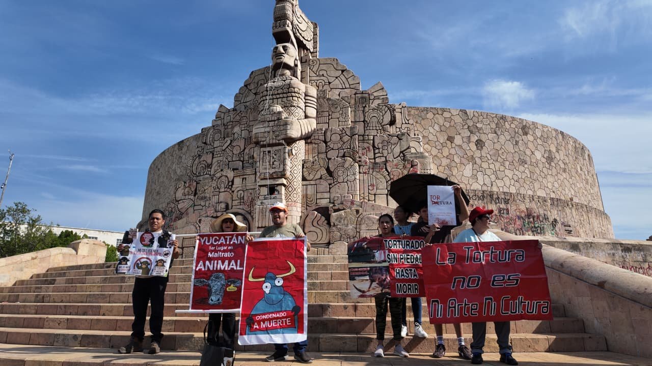Bullfighting supporters confront animal rights activists at the Monumento a la Patria in Merida, Yucatan.