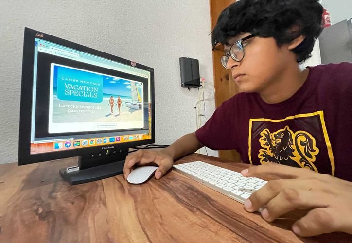 Caribe Mexicano tourism portal website on a computer screen
