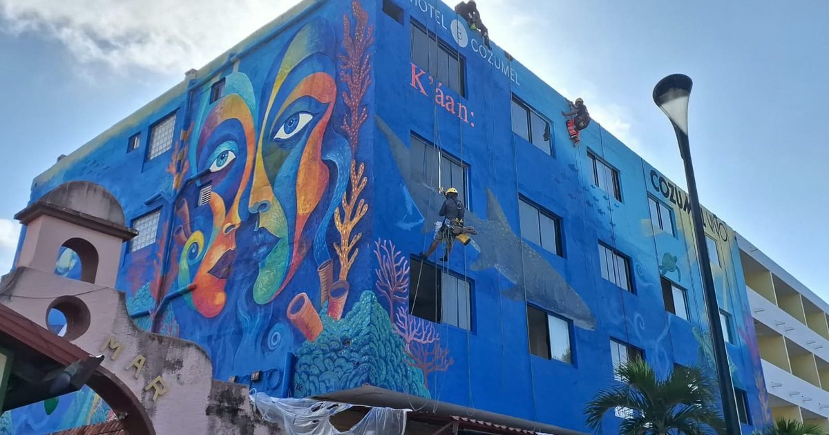 A monumental mural in Cozumel depicts sea turtles, whale sharks, fish and coral on a building facade.