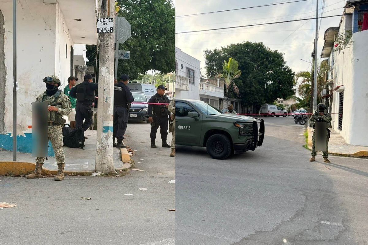 Law enforcement officers secure the scene where a man's body was found under a sheet in Playa del Carmen.