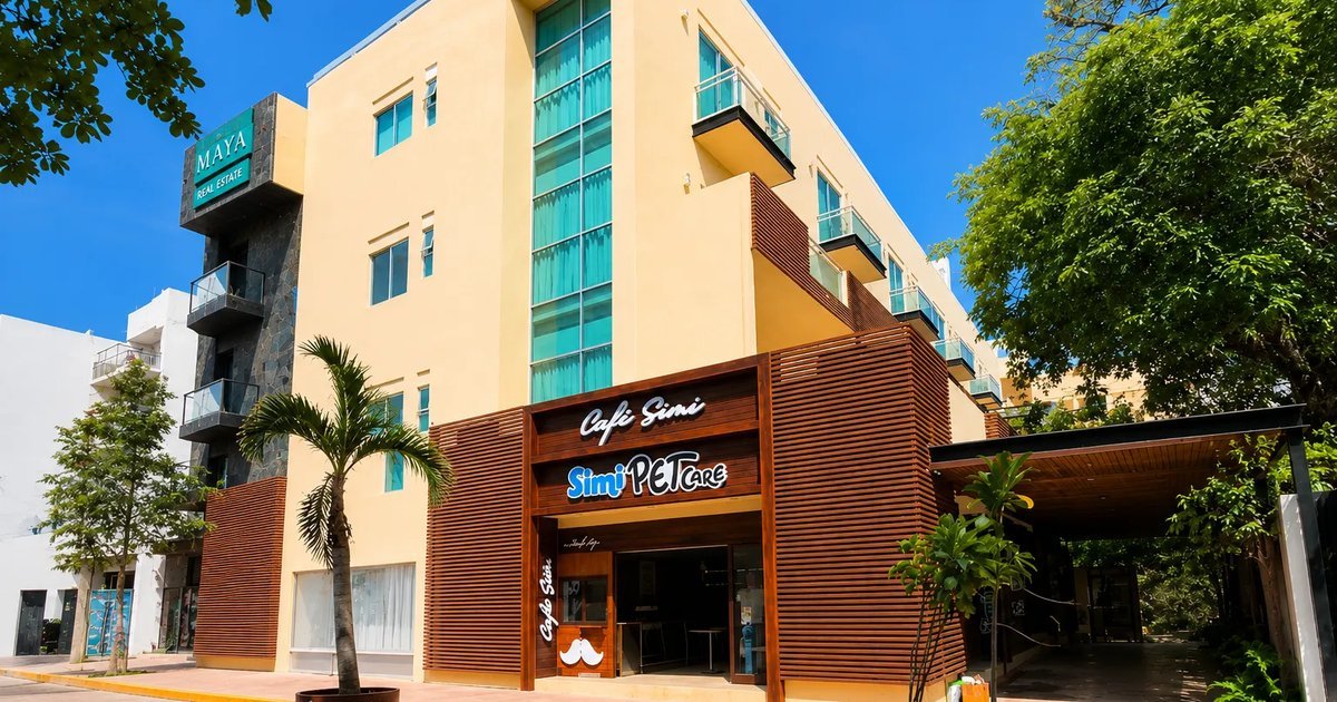 Signage for SimiPet Care and Café Simi on a storefront on Quinta Avenida in Playa del Carmen, Mexico.
