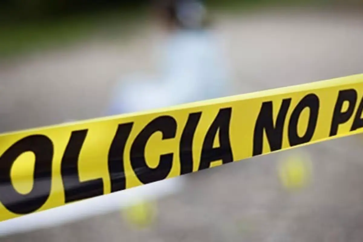 Police and emergency vehicles at the scene of a fatal shooting in the Punta Estrella residential development in Playa del Carmen.