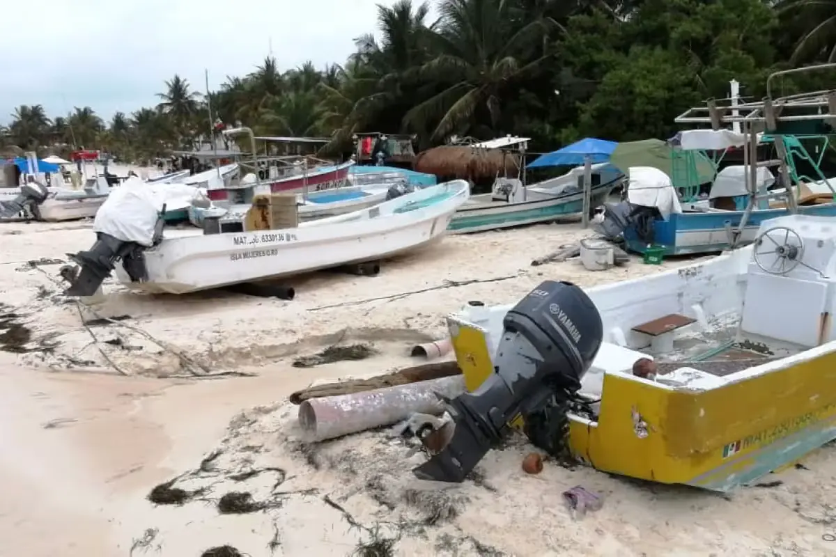 Outboard motors and fishing boats in Isla Mujeres, Quintana Roo