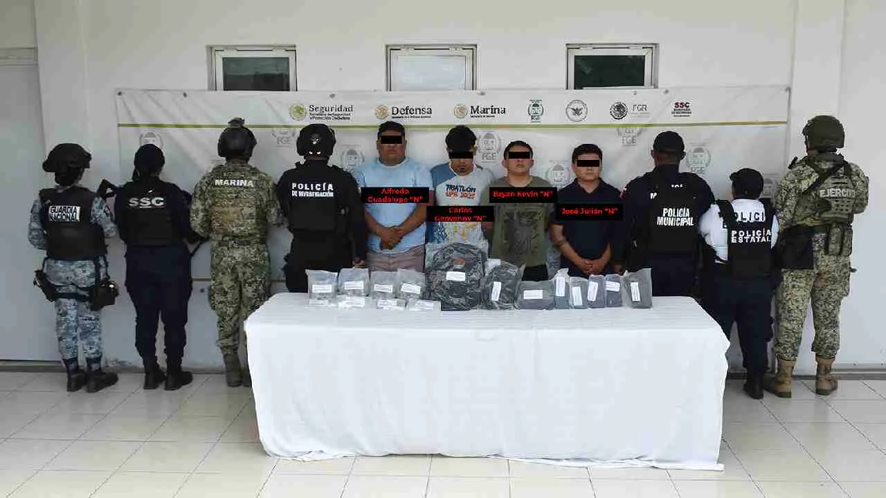 Seized drugs and tactical equipment from a drug bust in Bacalar, Quintana Roo.