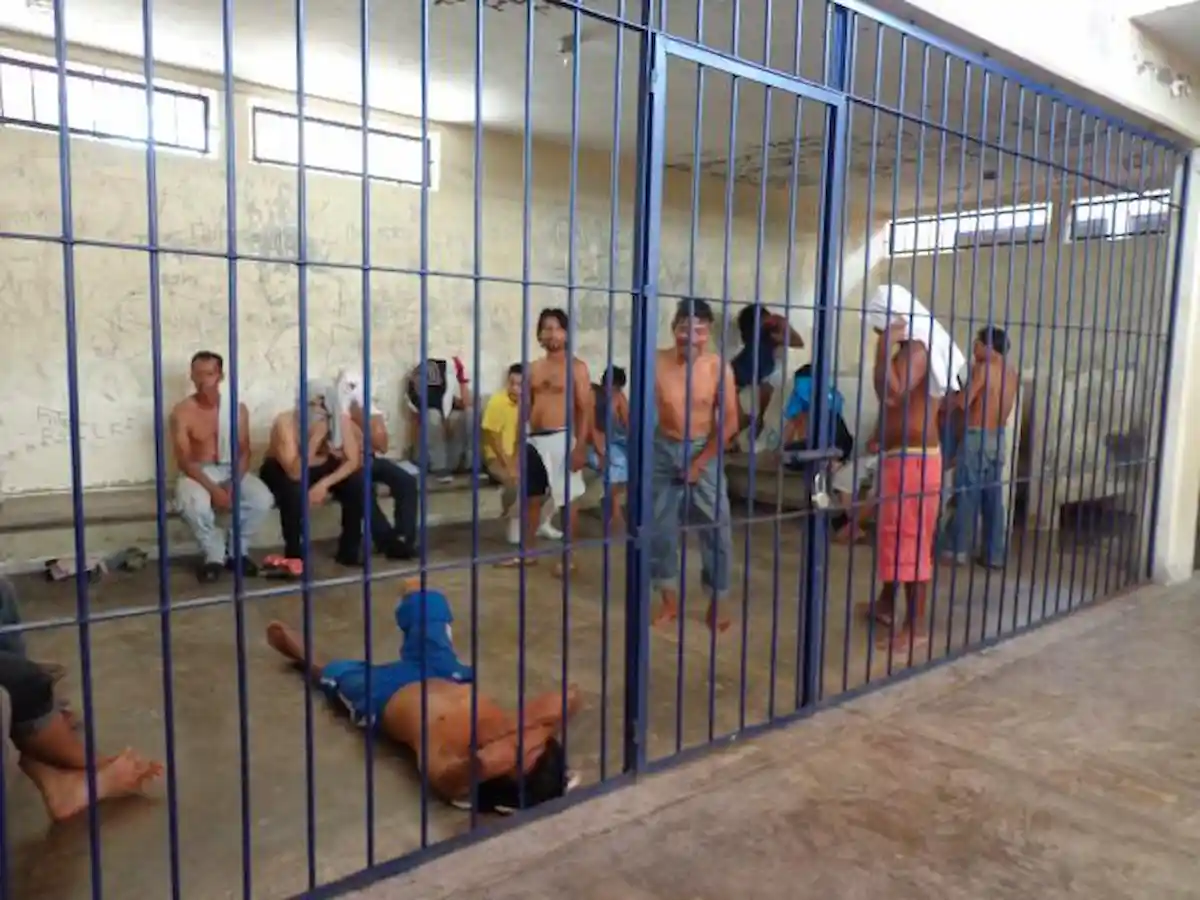 A homeless person speaks with an official at a municipal shelter in Cancún, Quintana Roo.
