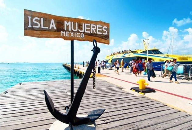 Maritime officials sign an agreement to expand the Isla Mujeres port facility in Quintana Roo, Mexico.