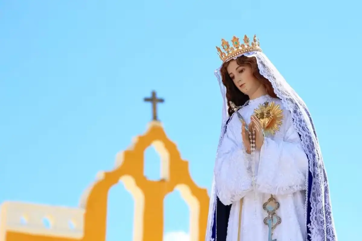 Visitors view the image of Our Lady of Izamal at the Archdiocesan Marian Shrine of the Immaculate Conception in Izamal, Yucatán.