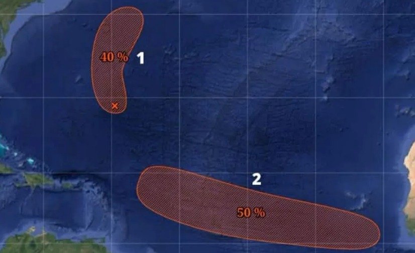 Satellite image showing a low-pressure system in the Atlantic Ocean being monitored by meteorologists.