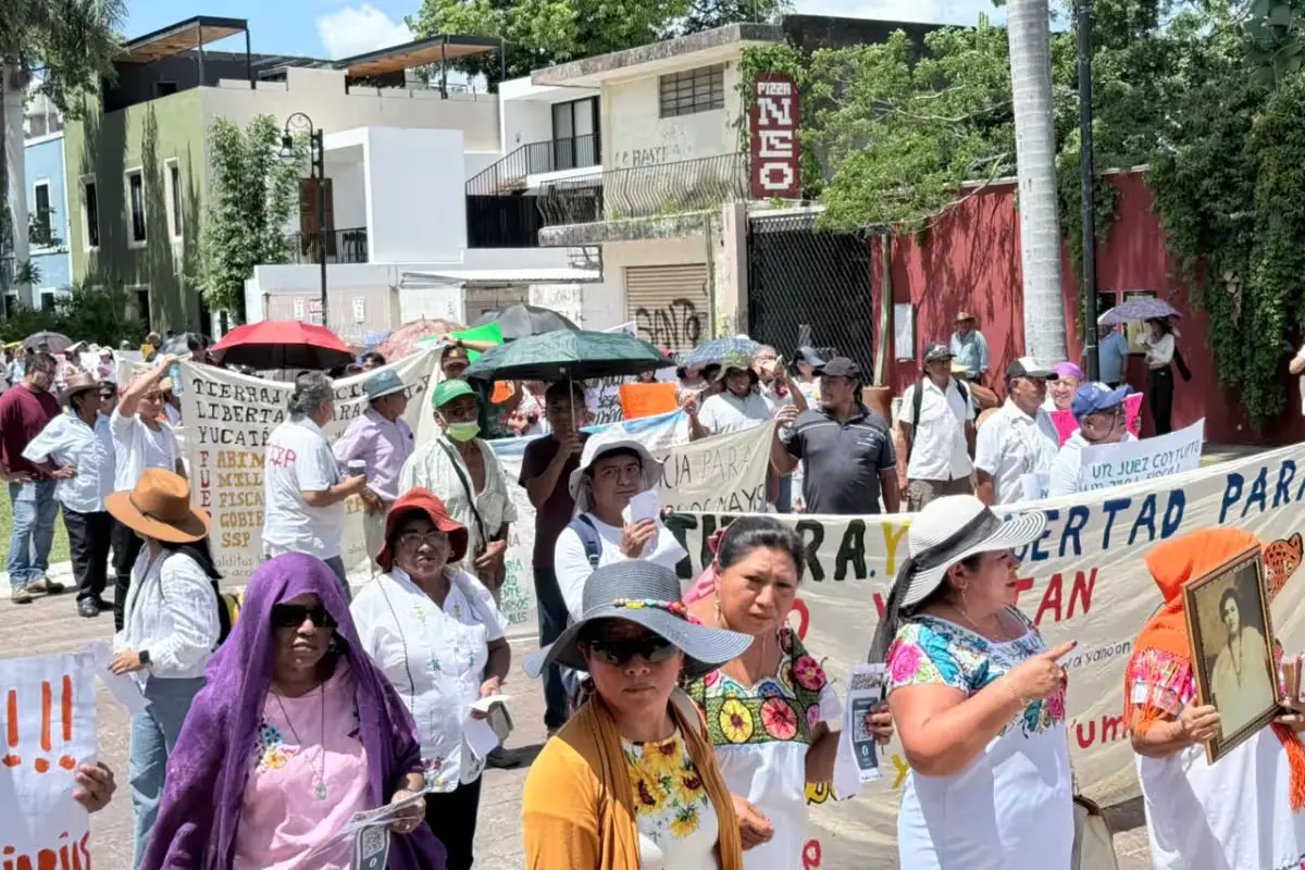 Mayan community members march through downtown Mérida to protest threats to their land and water.