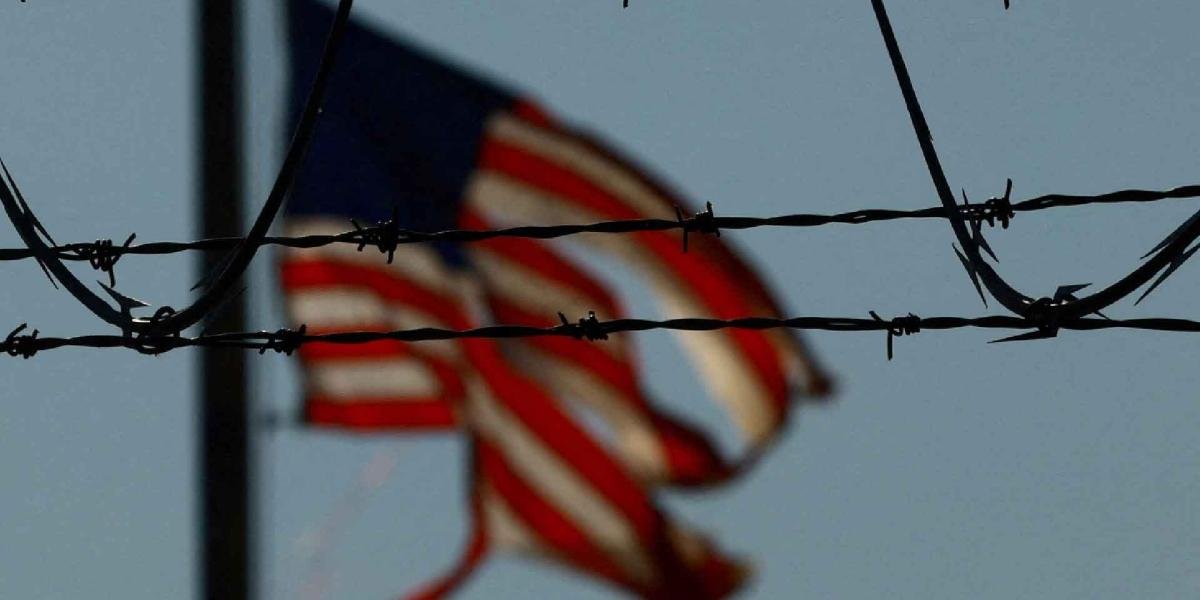 Mexican police officers take part in an operation against a migrant-smuggling network