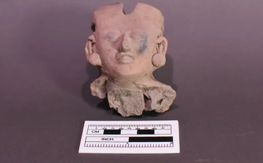 INAH specialists inspect a collection of pre-Hispanic ceramic fragments returned to Mexico from the United States