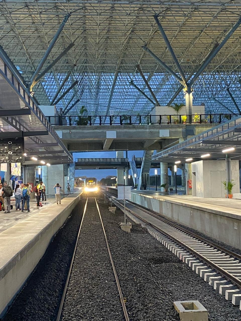 Construction workers and machinery on a railway project in Mexico.