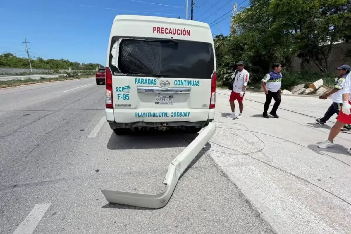 A motorcyclist lies unconscious on Federal Highway 307 after crashing into a passenger van near Playa del Carmen, Quintana Roo, Mexico.