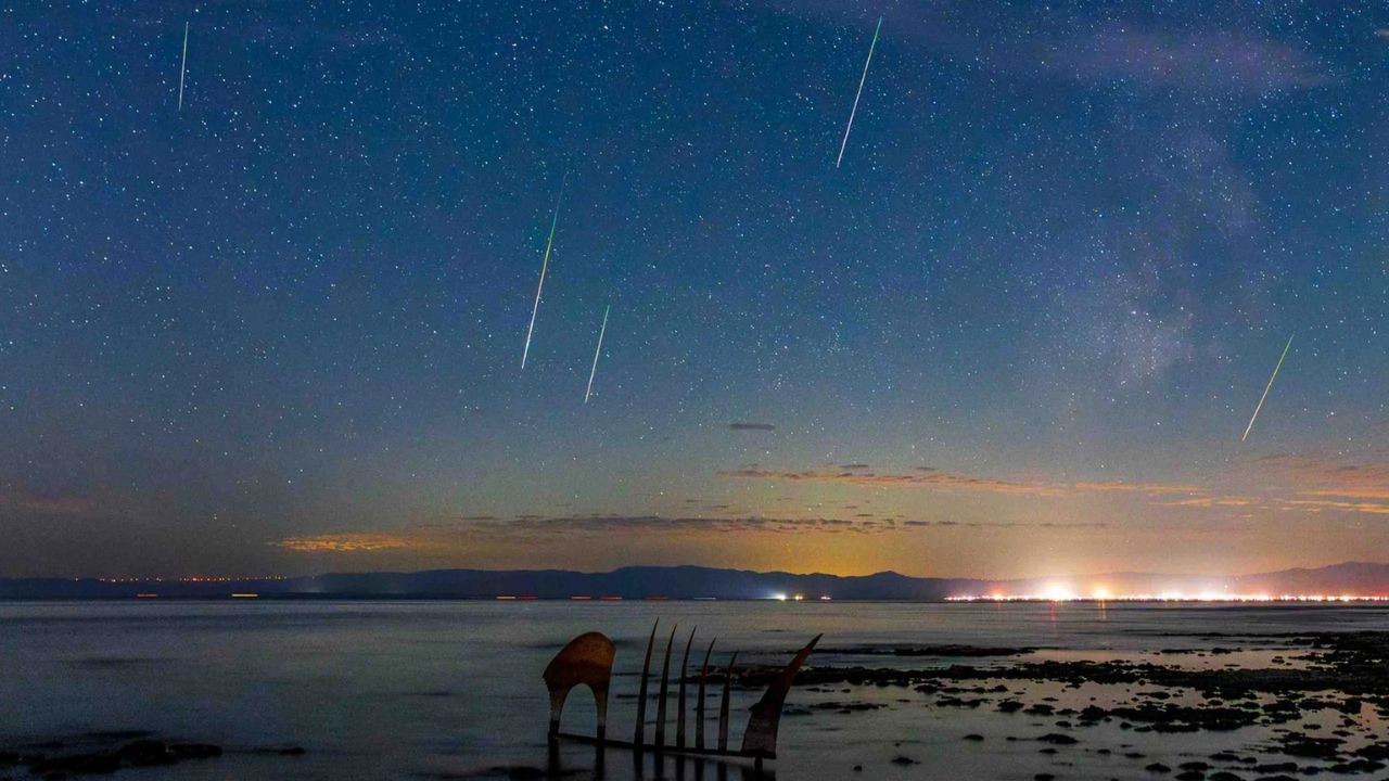 Perseid meteor shower streaking across the night sky over the Mexican Caribbean