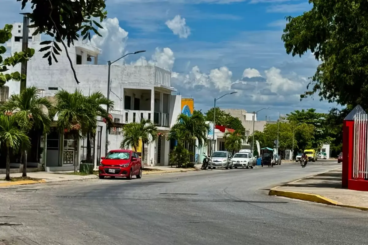 Residents of Playa del Carmen buy water from a tanker truck during a four day water outage