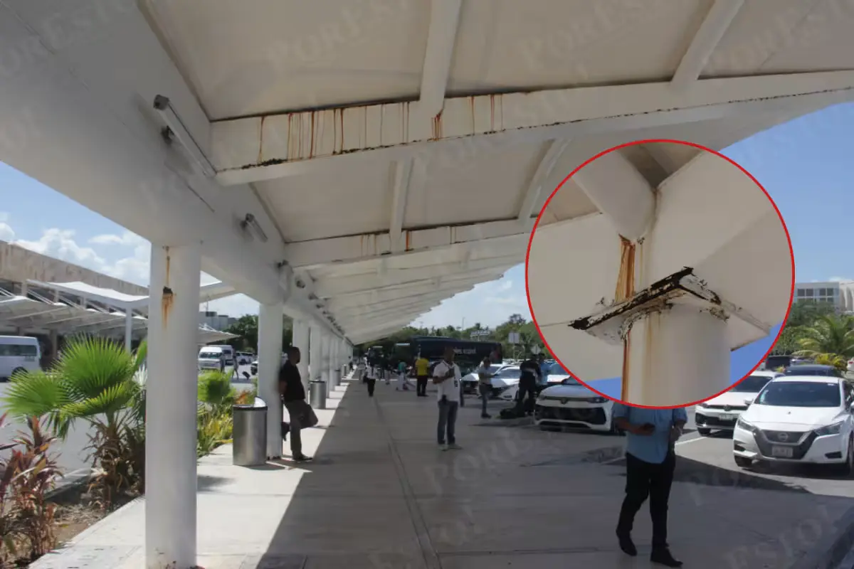 Corroded metal canopies at the boarding platforms of Terminal 3 at Cancun International Airport
