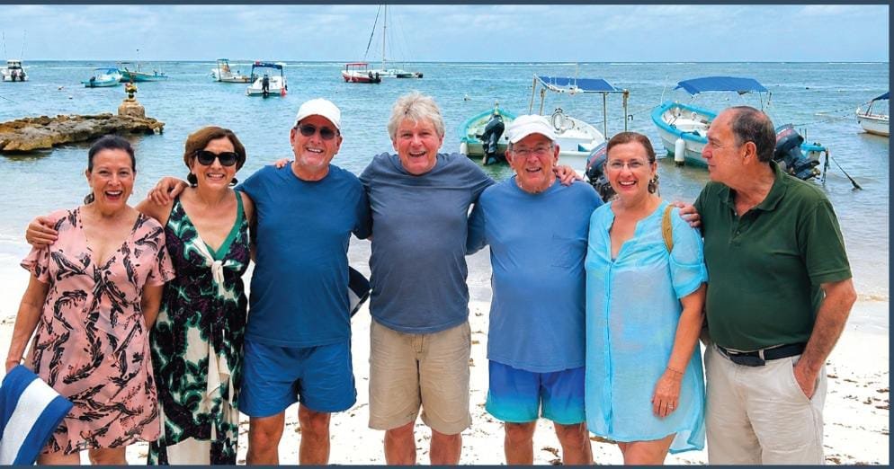 Seven of the Lopez Mena siblings who wrote a book about Akumal history