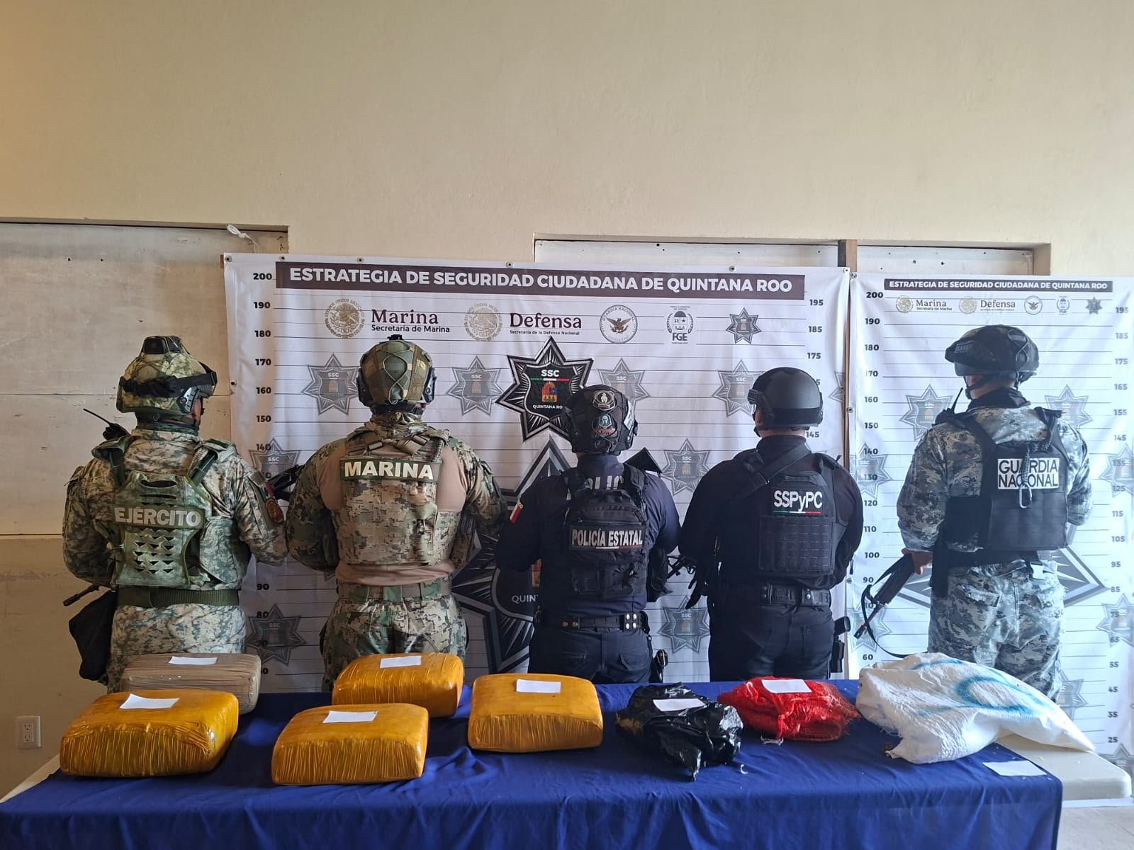 Packages of suspected marijuana wrapped in plastic on a beach in Tulum, Quintana Roo.