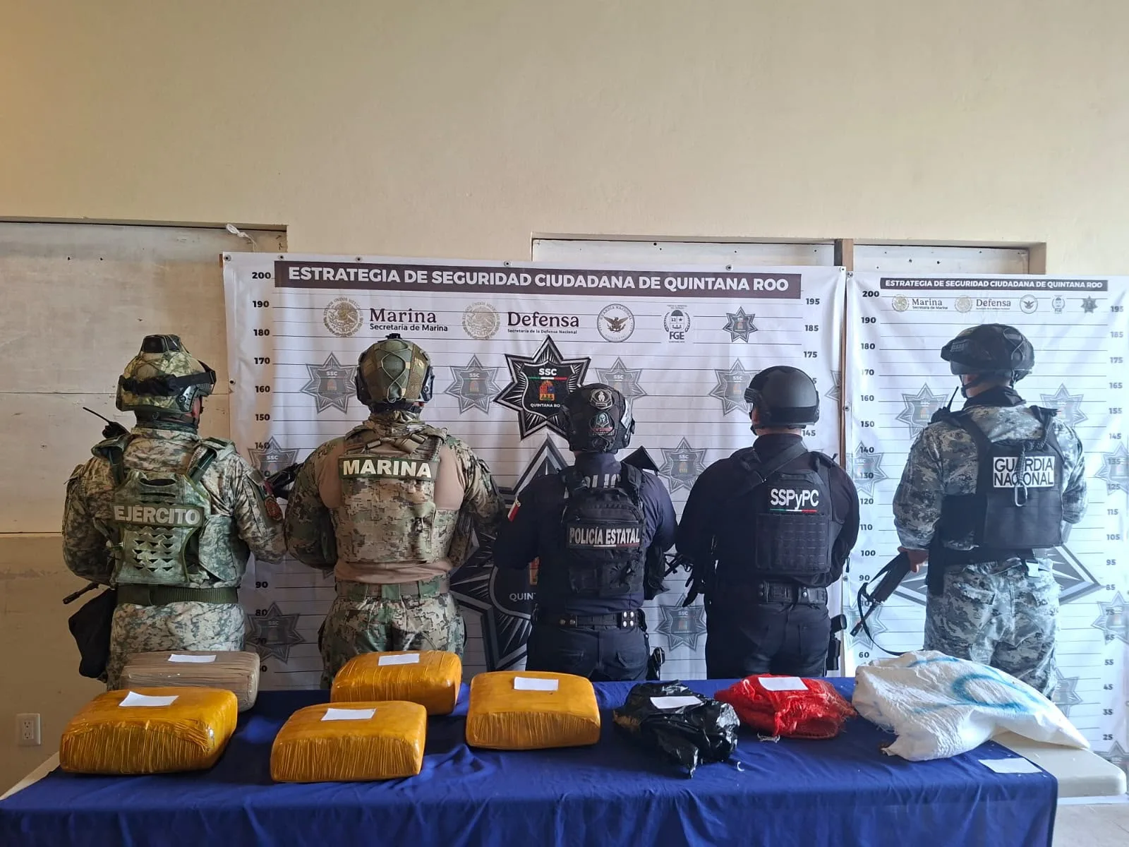 Packages of suspected marijuana wrapped in plastic on a beach in Tulum, Quintana Roo.