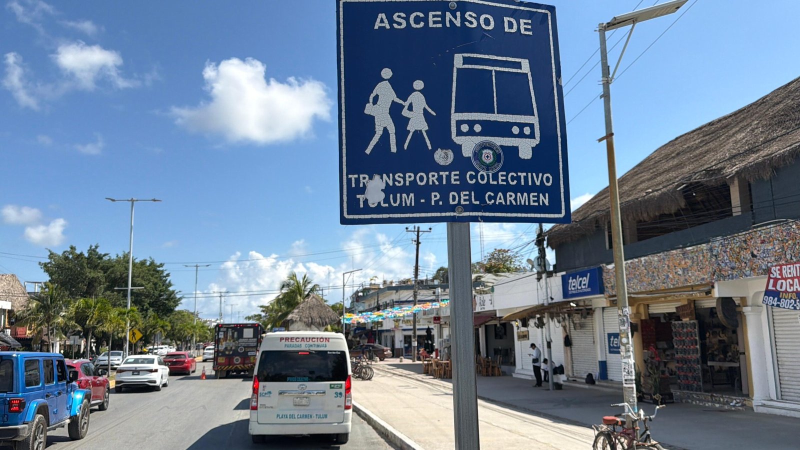 Transport vans on the Tulum-Playa del Carmen route waiting for passengers during a period of reduced demand.