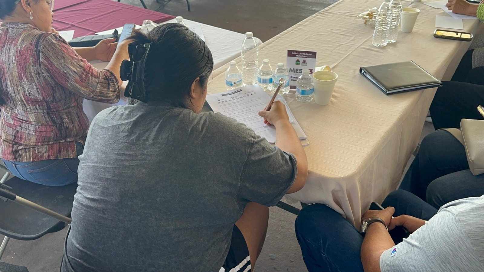 Members of the Tulum citizens collective speak during a public meeting in Quintana Roo.