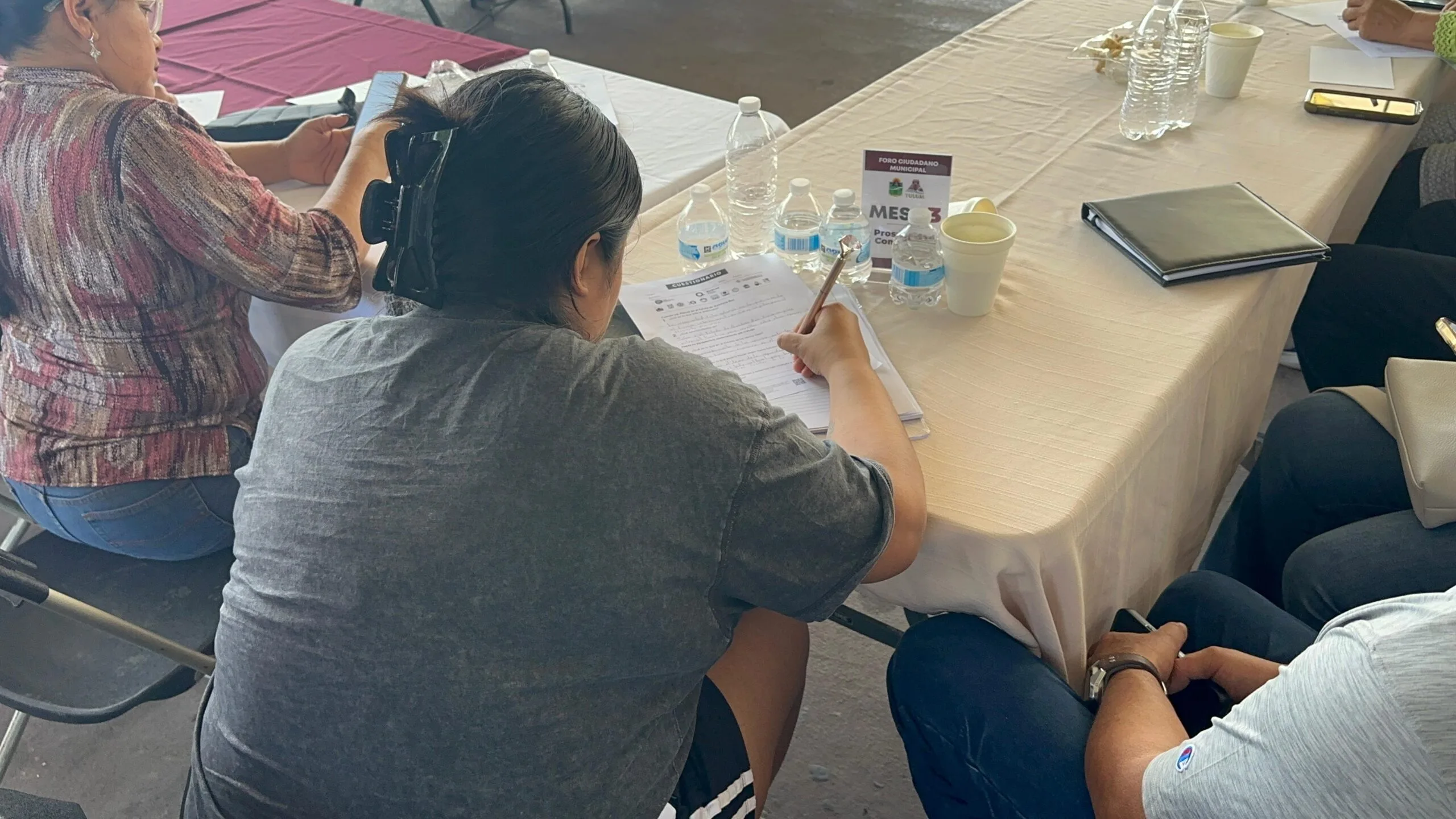 Members of the Tulum citizens collective speak during a public meeting in Quintana Roo.