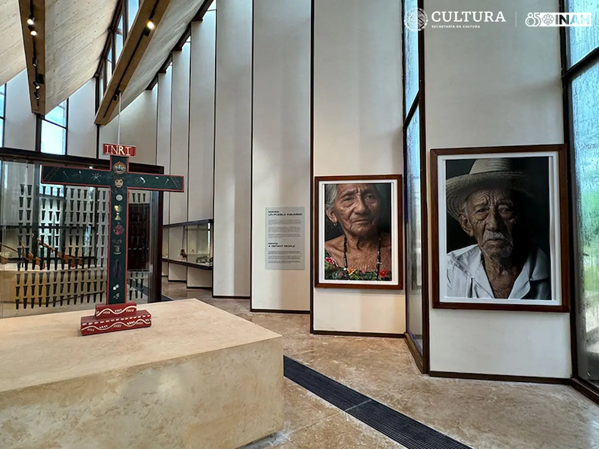 Visitors viewing Maya artifacts at the Regional Museum of the Eastern Coast in Tulum, Quintana Roo.