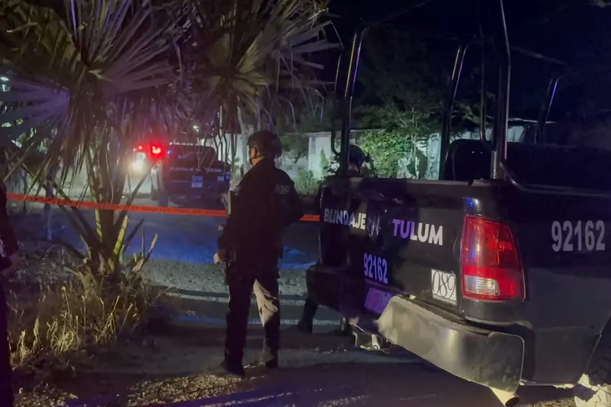 Tulum police officers at the scene of the fatal shooting of a man known as El Moreno.