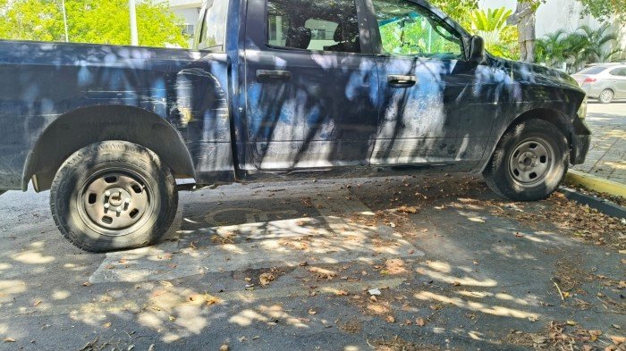 A vehicle parked in a disabled parking space outside the Playa del Carmen City Hall.
