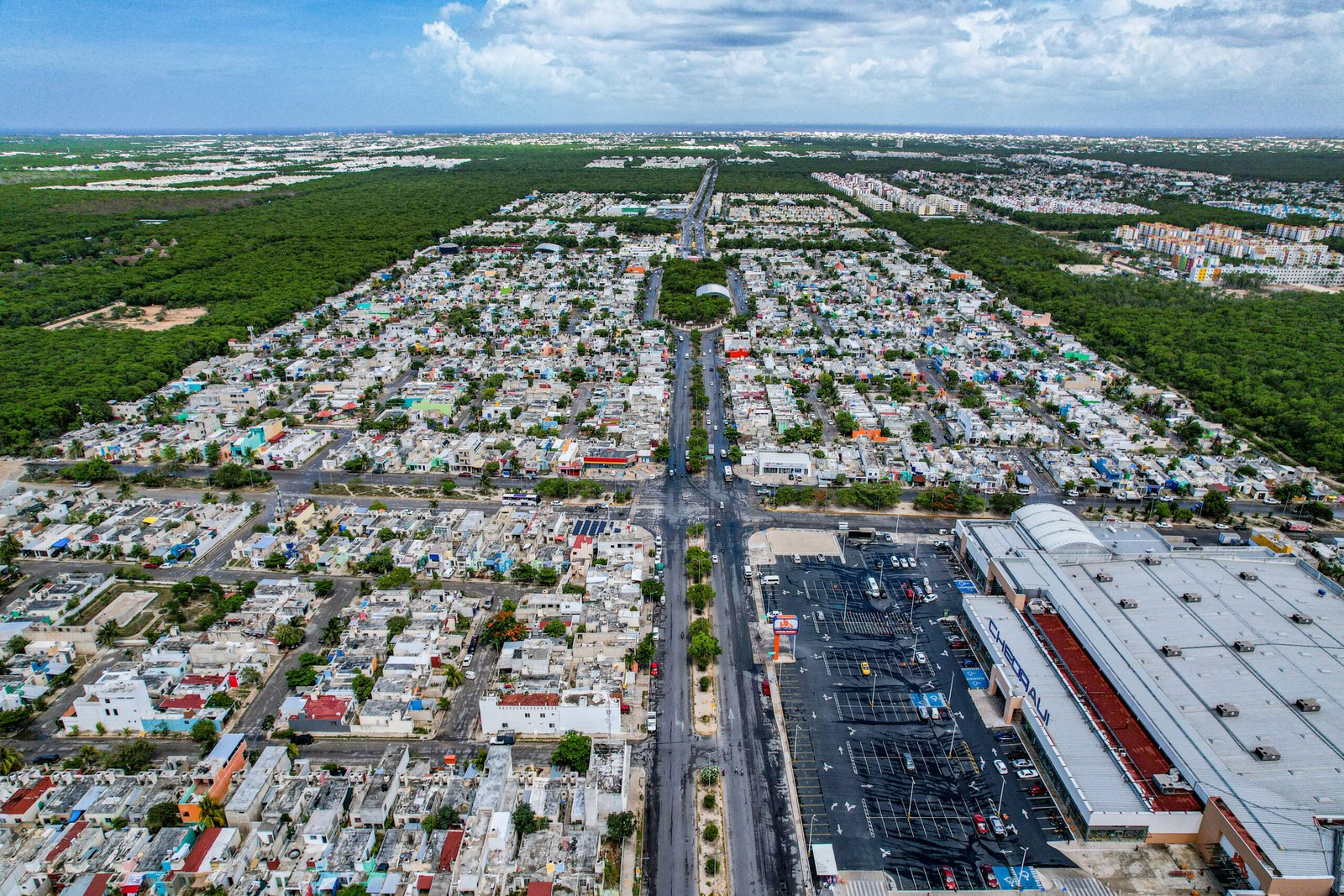 View of the Villas del Sol neighborhood in Playa del Carmen with the city skyline in the background